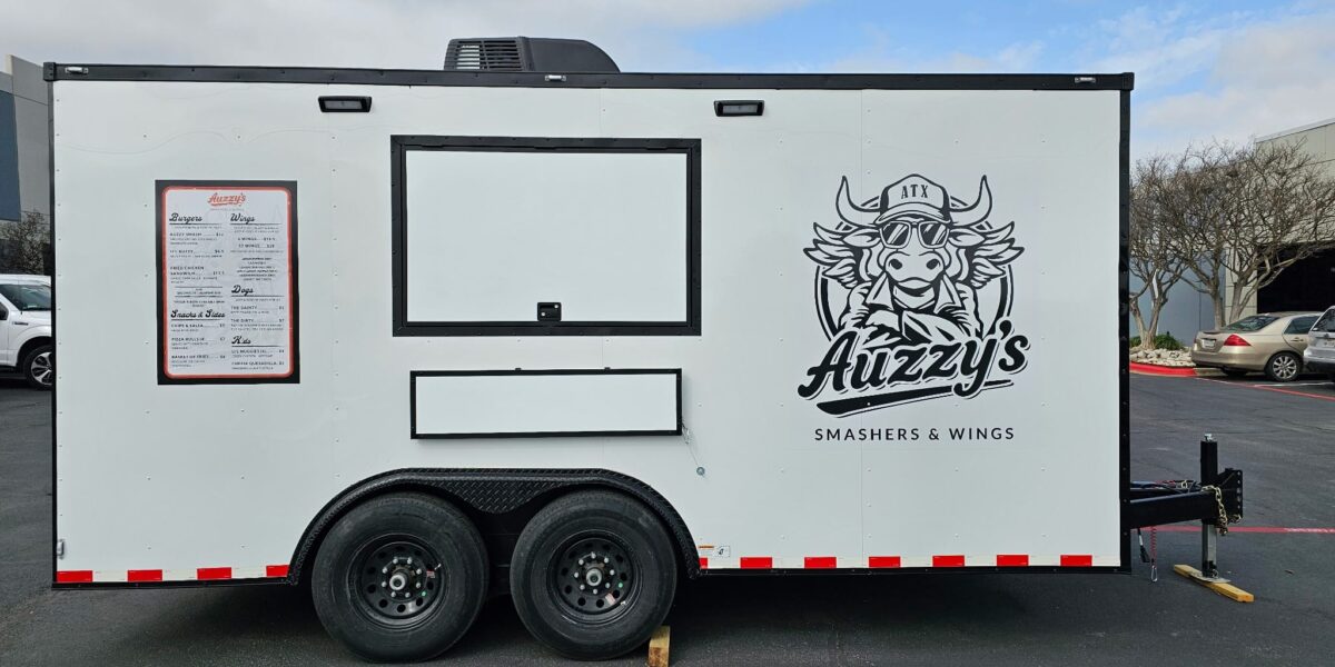 Custom food trailer decal and branded character logo printed by our local print shop near me in Austin.