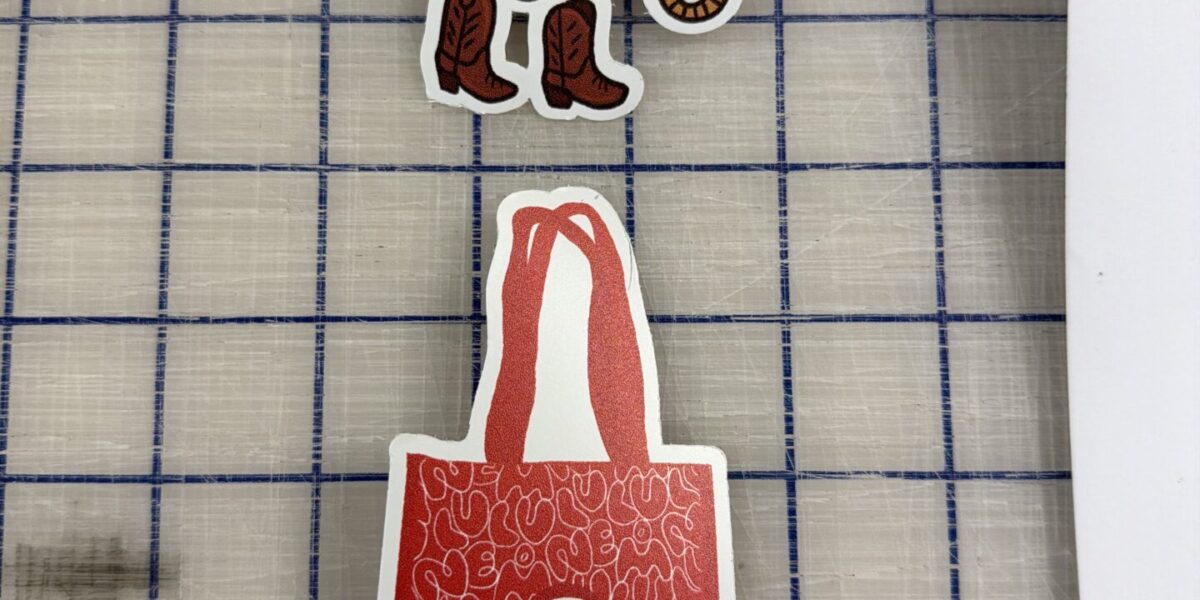 Custom die-cut vinyl stickers and branded character decals produced by our local print shop near me in Austin.