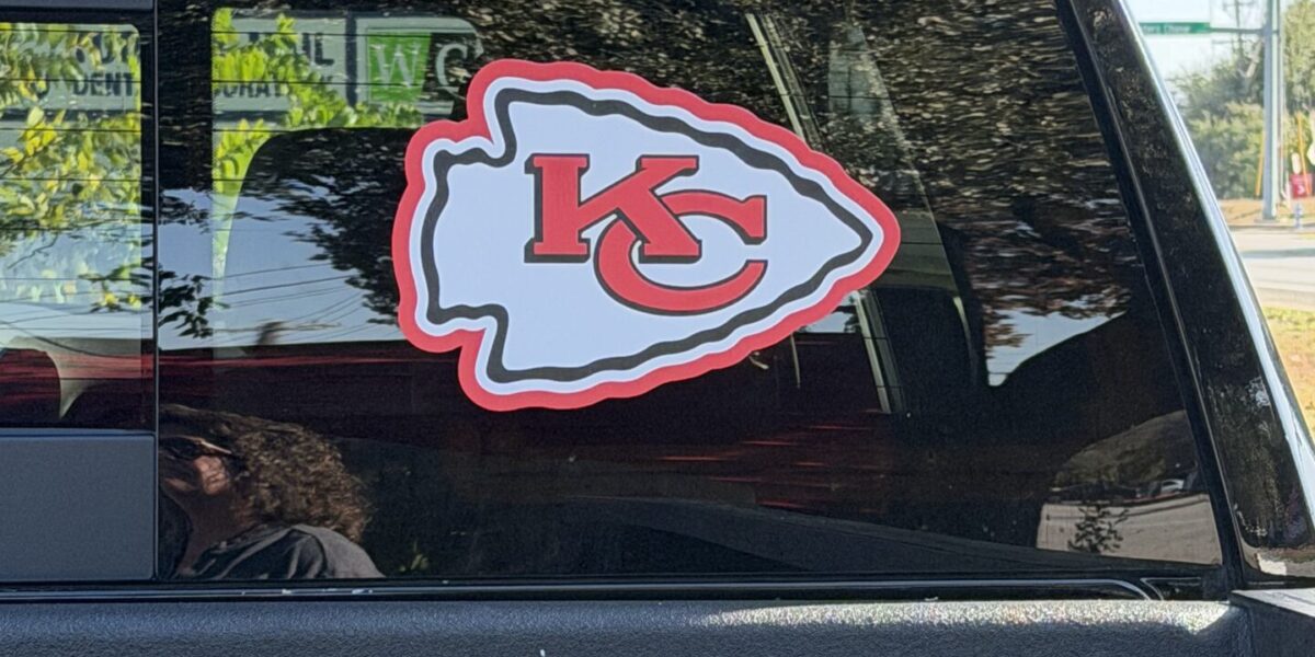 Custom car window decal and vinyl sports logo printed and installed by our local print shop near me in Austin.