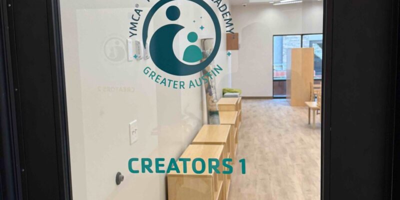 Custom vinyl lettering for glass doors and office identification decals installed by our local print shop near me in Austin.