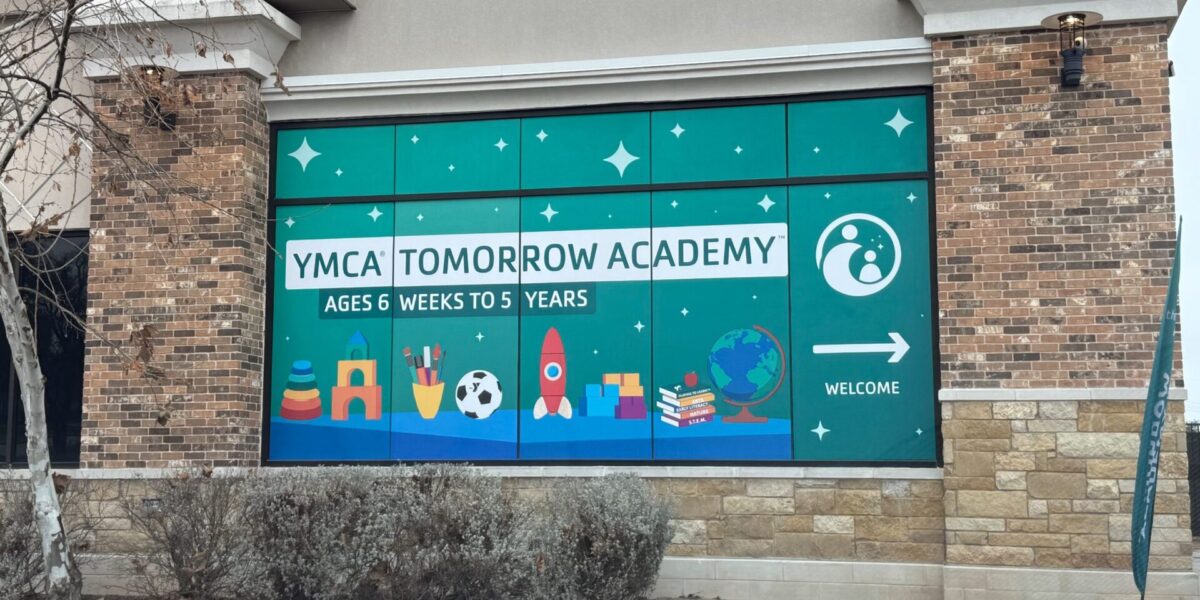 Custom storefront window decal and large-scale vinyl branding installed by our local print shop near me in Austin.