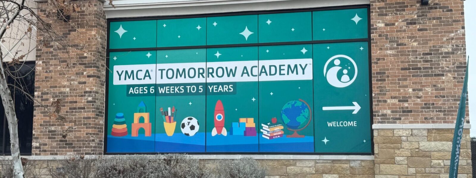 Custom storefront window decal and large-scale vinyl branding installed by our local print shop near me in Austin.