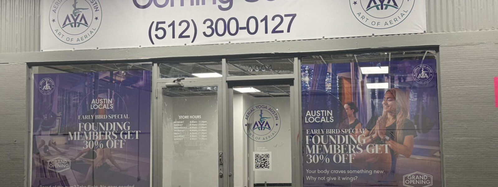 Full storefront signage package including custom vinyl banner and perforated window film by our Austin print shop near me.
