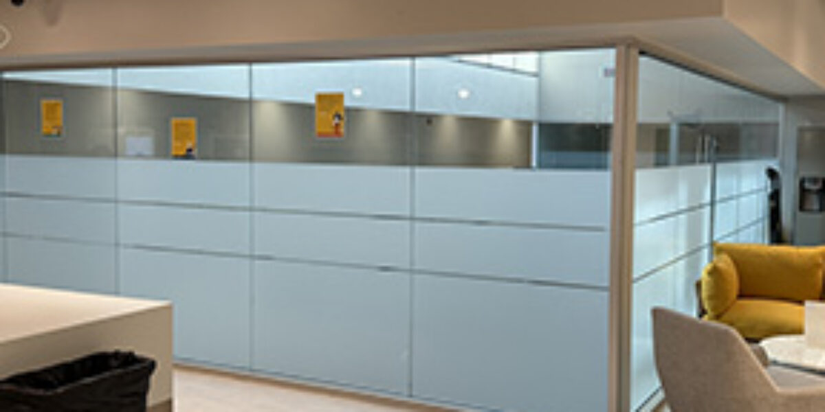 Frosted privacy film and custom window decals installed by our local print shop near me in Austin.