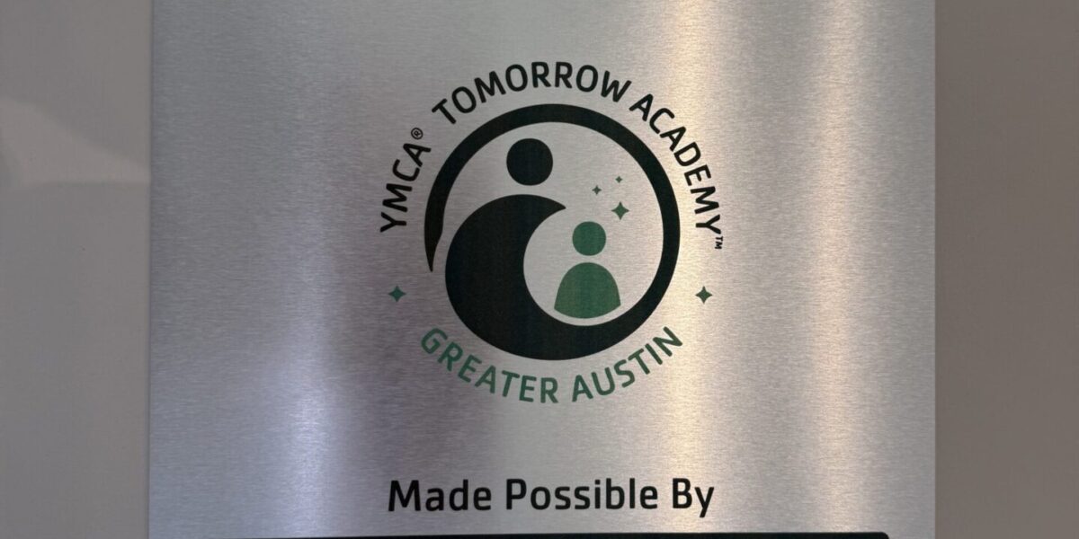 Custom brushed aluminum plaque sign and metal donor recognition plate installed by our local print shop near me in Austin.