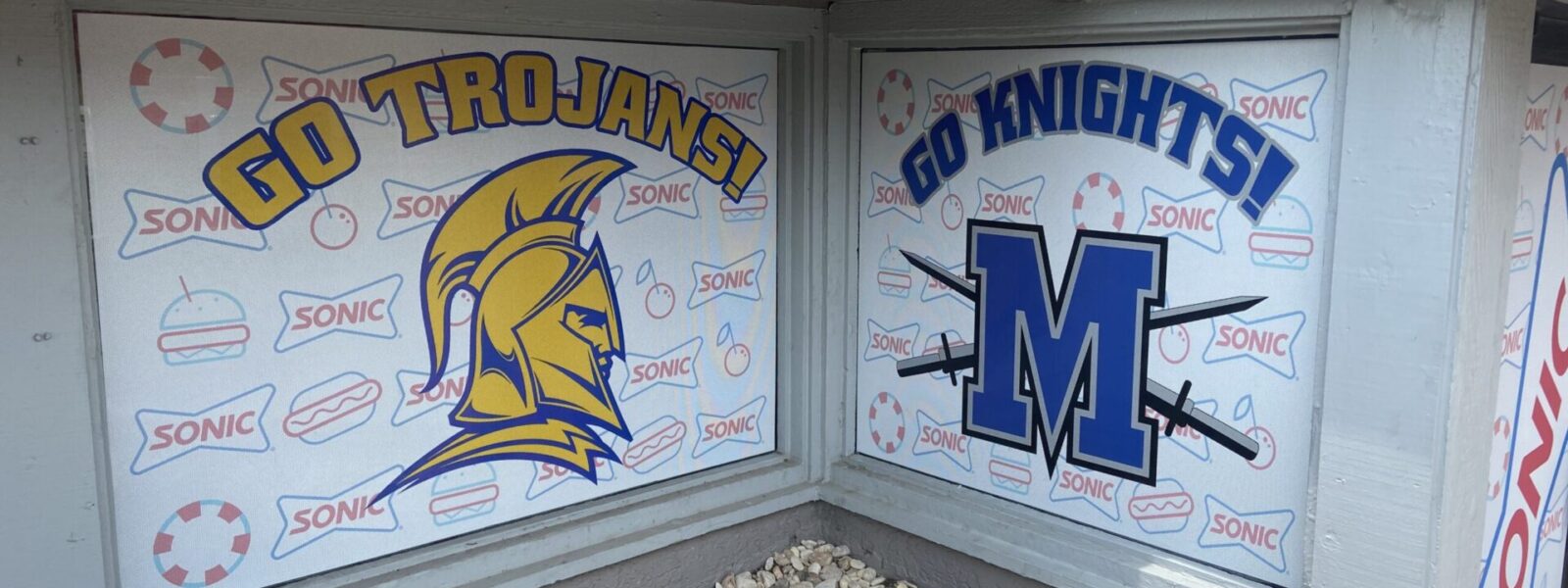 Custom one-way perforated window clings and vibrant business storefront graphics with professional installation by our local print shop near me in Austin.