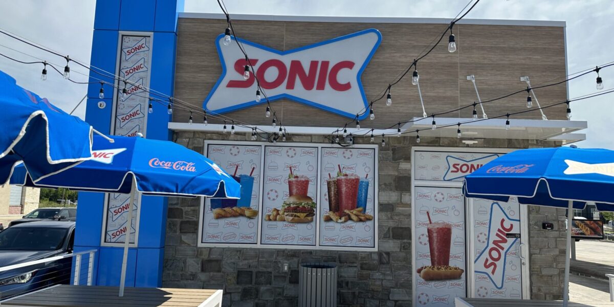 Professional perforated window film and one-way vision graphics with expert installation by our local print shop near me in Austin.