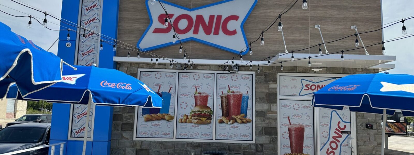 Professional perforated window film and one-way vision graphics with expert installation by our local print shop near me in Austin.